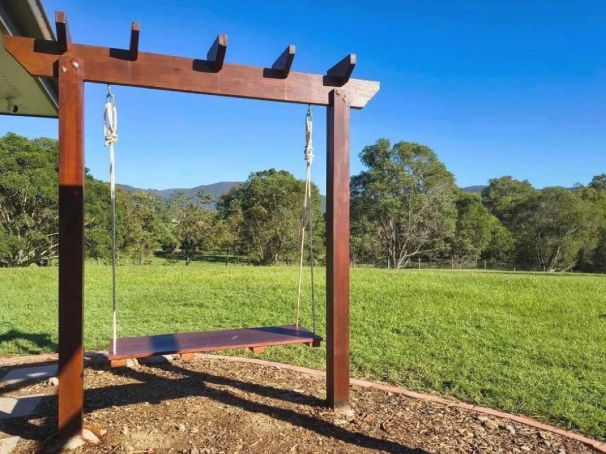 Custom freestanding timber swing made by Aaron